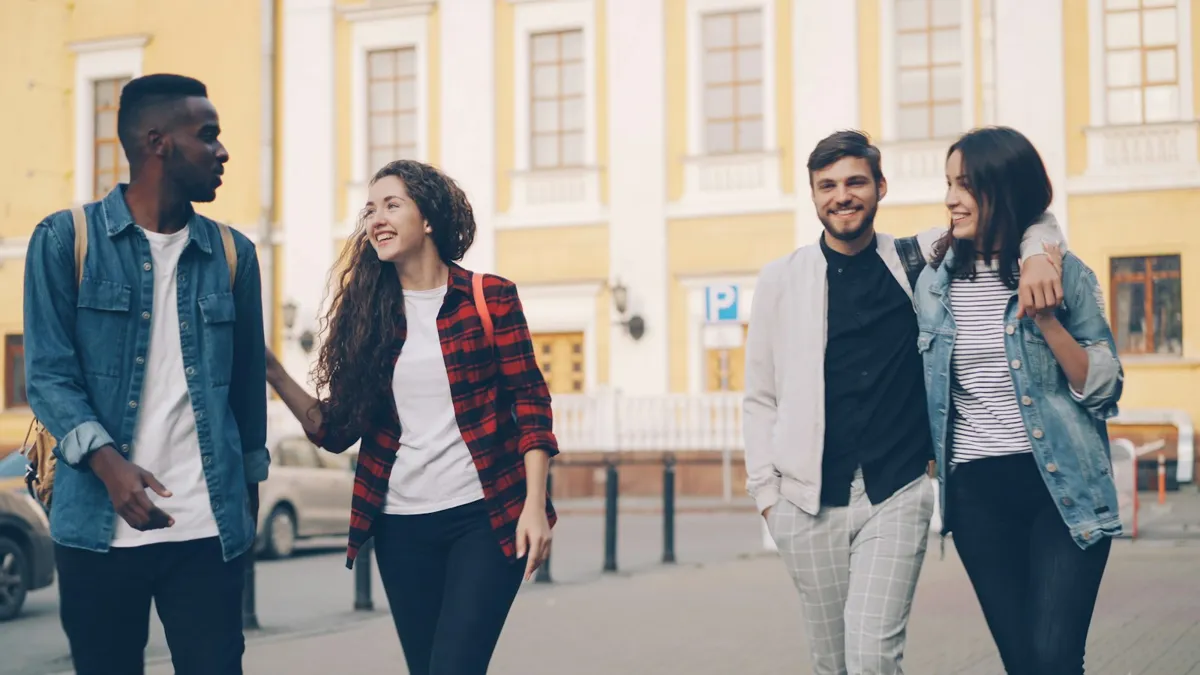 Friends laughing together on a walk